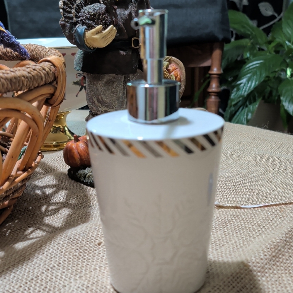 White and Silver Soap Dispenser